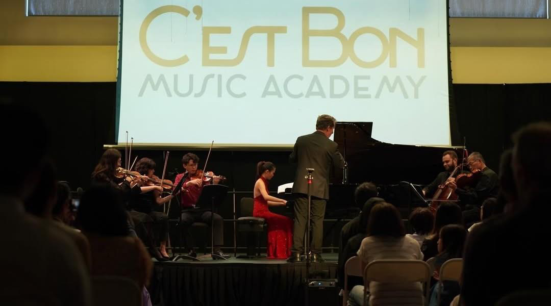 Karen Matsui performing Mozart's Piano Concerto No. 21 with the C'est Bon Faculty Orchestra