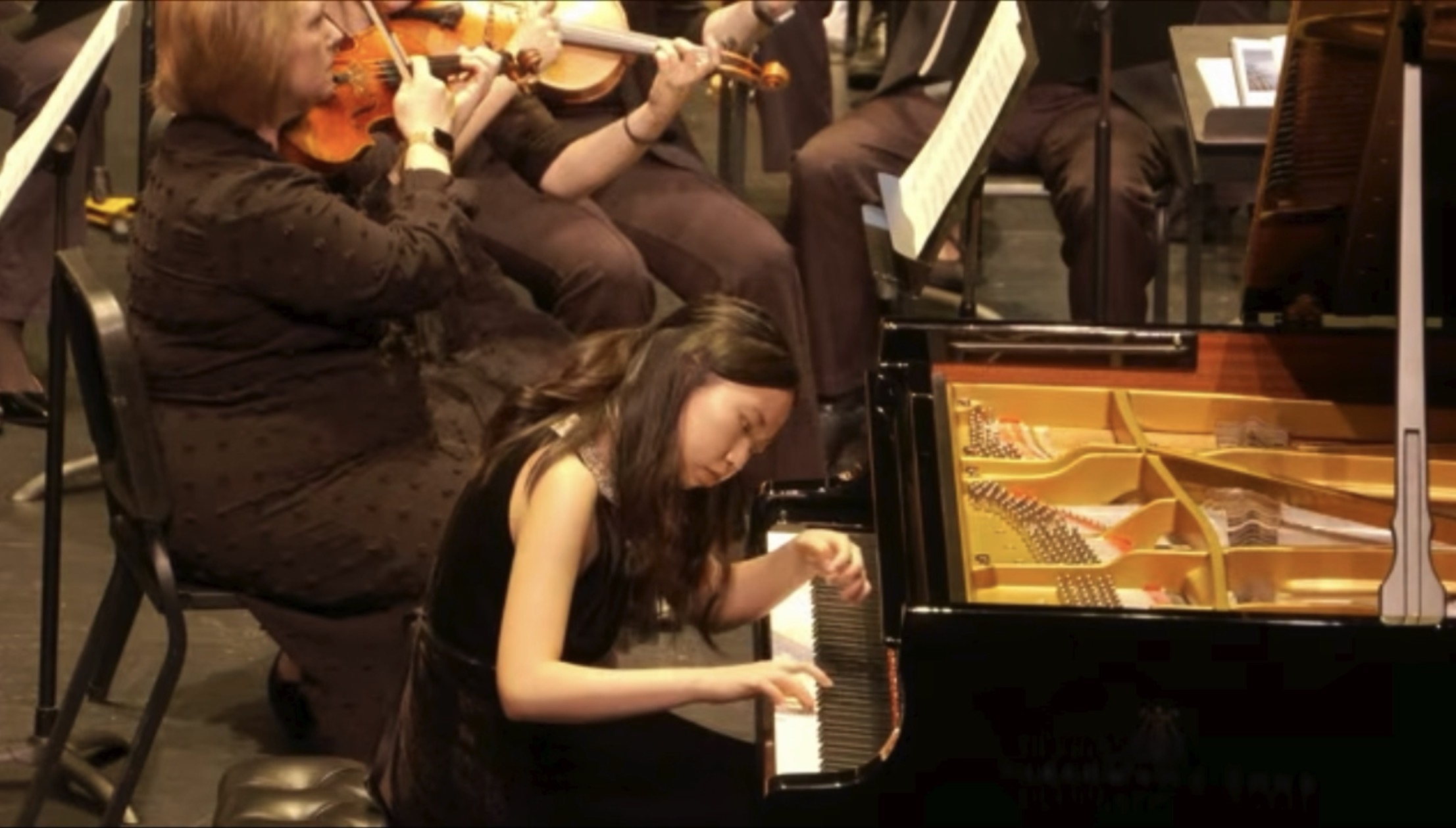 Meining Wu performing Rachmaninoff Piano Concerto No. 2 with the Central Texas Philharmonic at the TSIPF Finale Concert